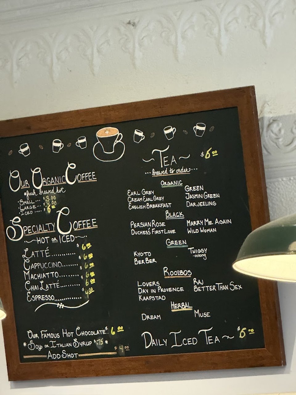 Printed cafe menu with breakfast and lunch choices.